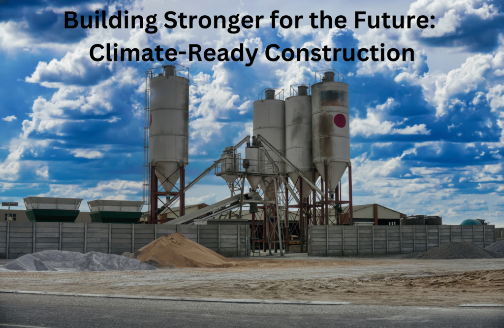 A construction site featuring large industrial cement silos under a partly cloudy blue sky. Piles of sand and gravel are in the foreground, while conveyor belts and metal structures connect the silos. The image includes a bold black text overlay that reads: "Building Stronger for the Future: Climate-Ready Construction.