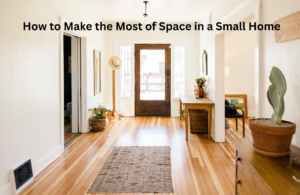 A bright and minimalistic home entryway with wooden flooring, a rustic rug, and a wooden console table. The space is decorated with potted plants, a hat stand, and framed artwork, emphasizing an airy and spacious feel. The text 'How to Make the Most of Space in a Small Home' is overlaid on the image.